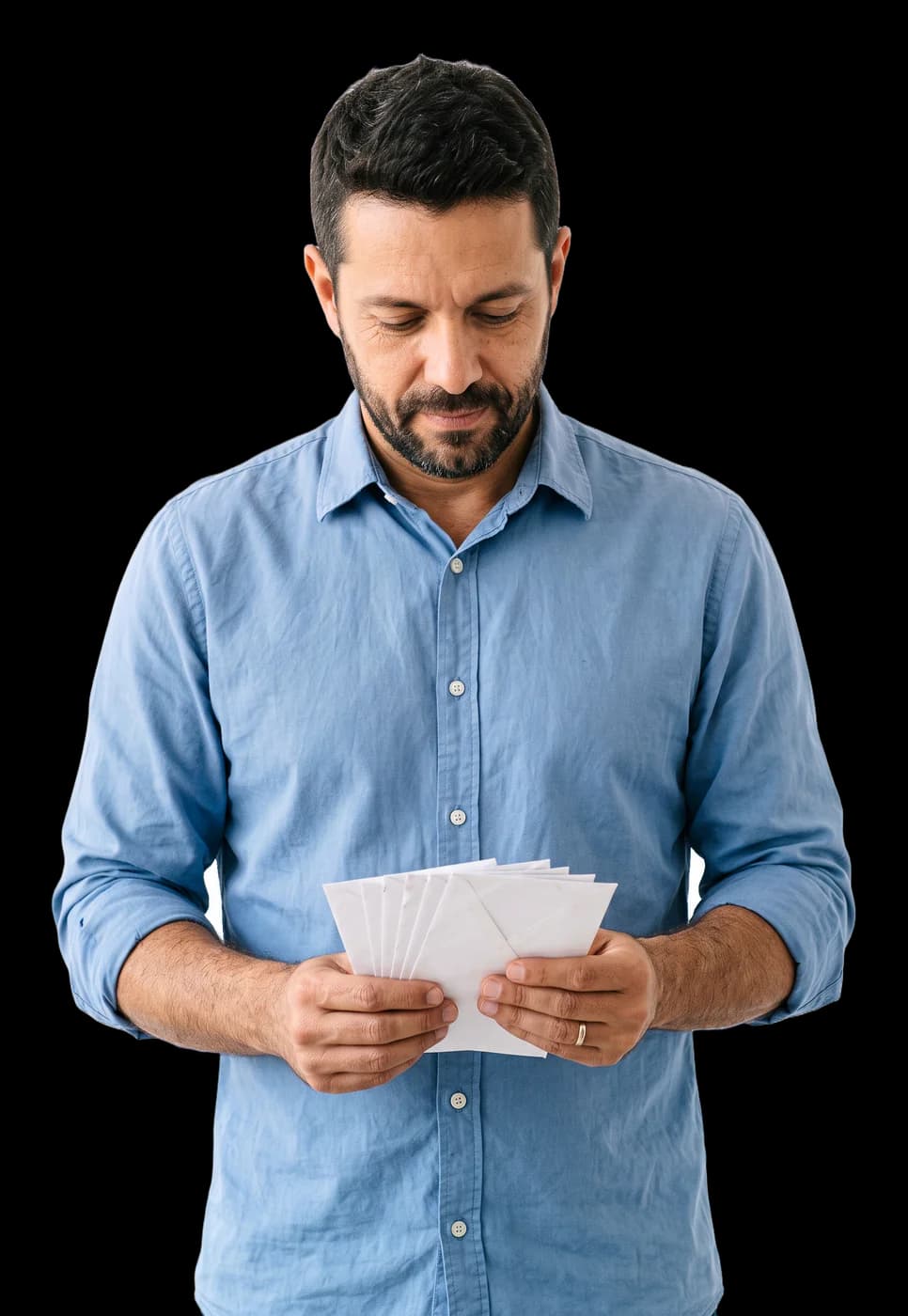 Man holding a small stack of envelopes